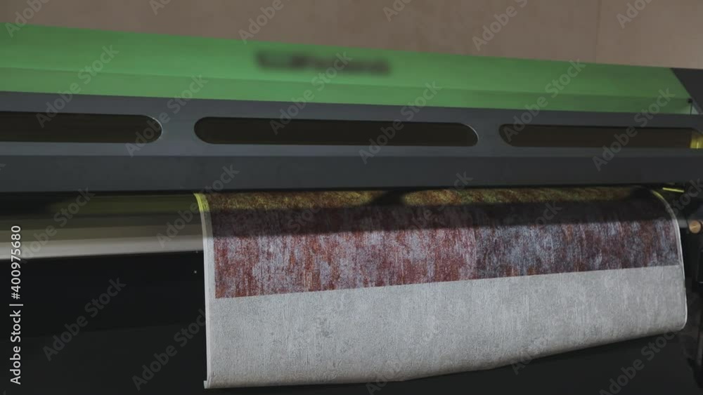 Modern wallpaper factory. Industrial printer making new wallpaper