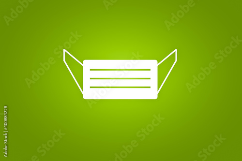 white illustrated mask on a green background