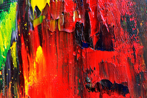 Oil abstraction, large textured spot of red, close-up