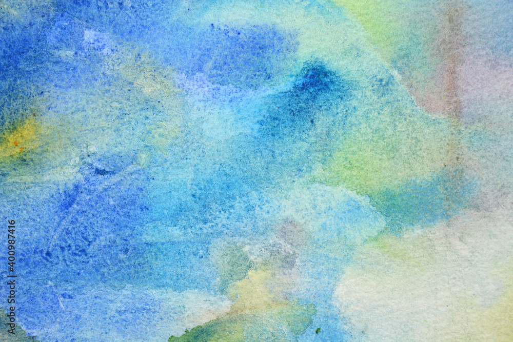 Delicate blue background with watercolors, paper texture