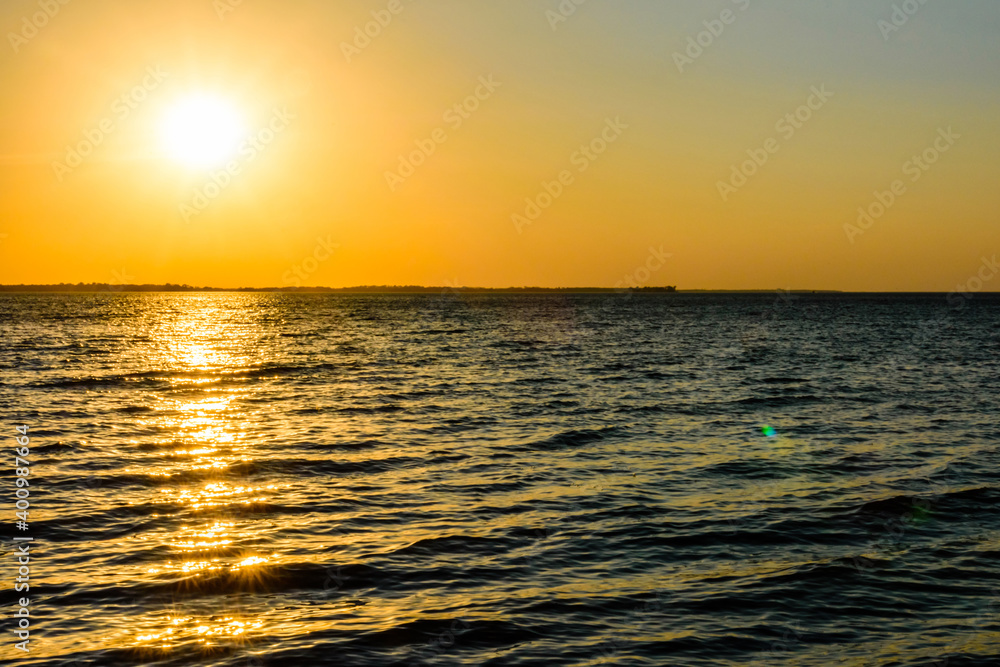 Obraz premium View on a Kremenchug reservoir at sunset. Summer landscape