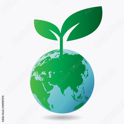 地球から育つ緑の環境の新芽 green sprout growing on earth. think about environmental ecology