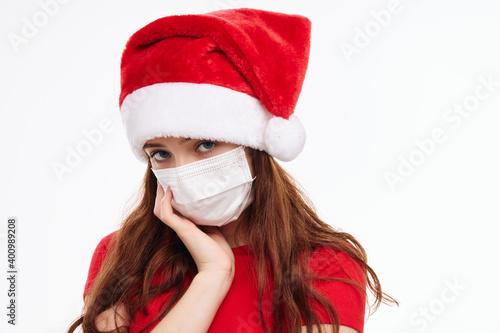 cute girl medical mask christmas hat holiday cropped view