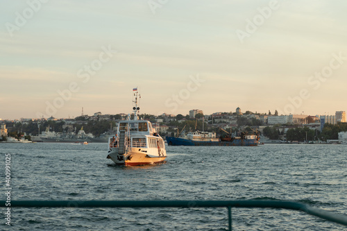 Ship floats on the water in the port city