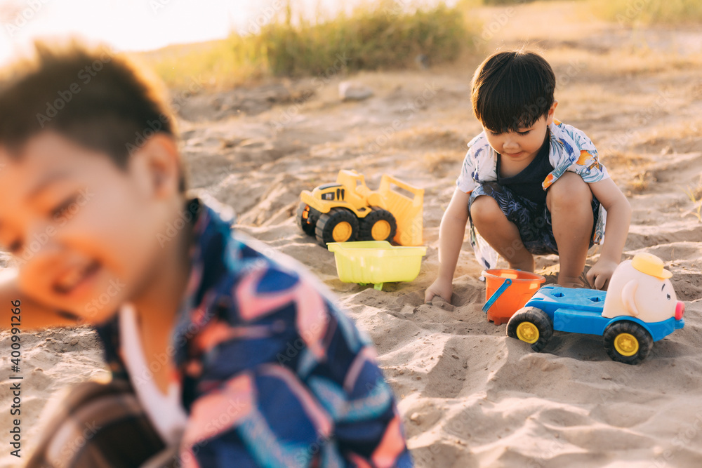 Portrait of happy Two little boy on summer beach vacation Portrait of happy Two little boy on summer beach vacation
