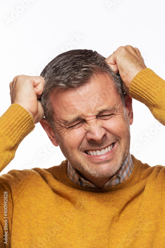 Frustated and upset caucasion middle-aged man 0110 cotrasty version