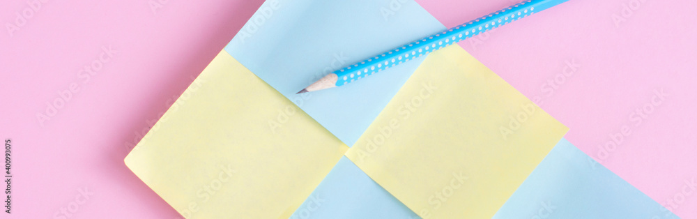 stationery minimal concept on pink background. Notepad with with stickers for notes stationery minimal concept on pink background. Notepad with with stickers for notes