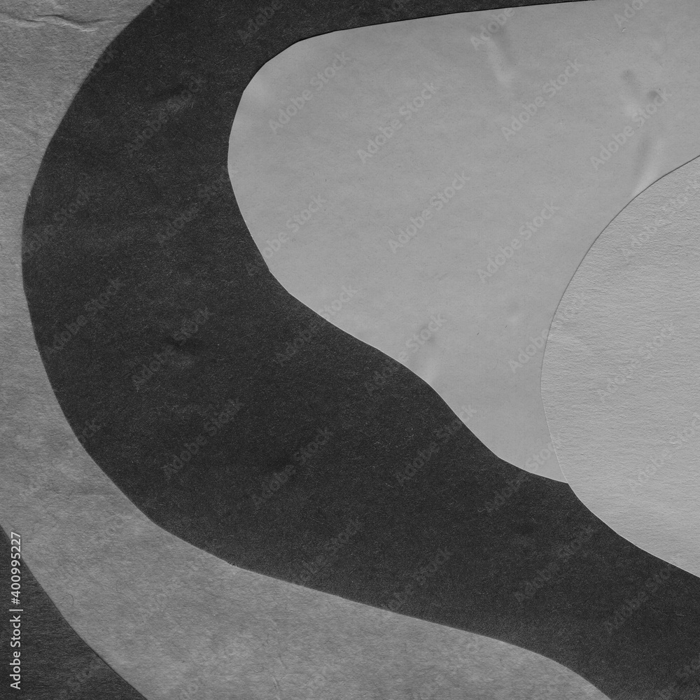Black torn paper collage close-up. Texture made from various paper and cardboard parts. Damaged old paper background. Vintage blank wallpaper. Material design backdrop. Black torn paper collage close-up. Texture made from various paper and cardboard parts. Damaged old paper background. Vintage blank wallpaper. Material design backdrop.
