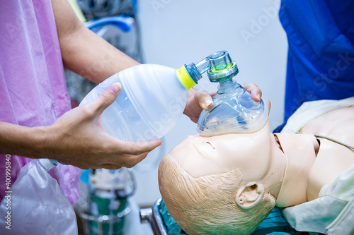фотографія Hands holding a ambu bag on dummy patient, first aid training, CPR medical proce