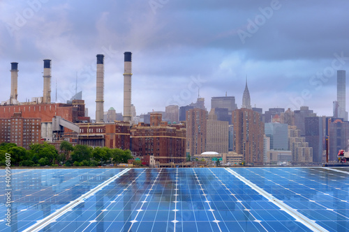 Solar panel over cityscapes, solar power green energy for life concept,New York City USA,
