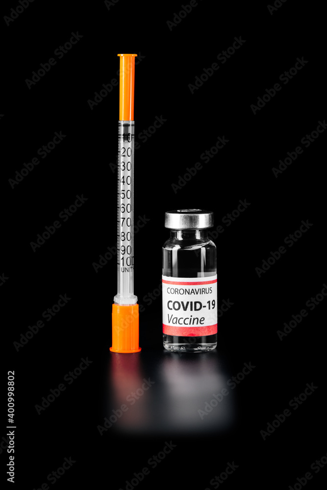 COVID-19 vaccine isolated on black background. Healthcare And Medical concept. COVID-19 vaccine isolated on black background. Healthcare And Medical concept.