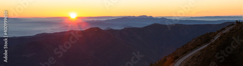 Mountain road with spectacular views of mountain ranges with sunset or sunrise  panoramic view. Montseny  Montserrat  Turo de l Home  Barcelona  Catalonia  Spain. Travel and outdoors concept.