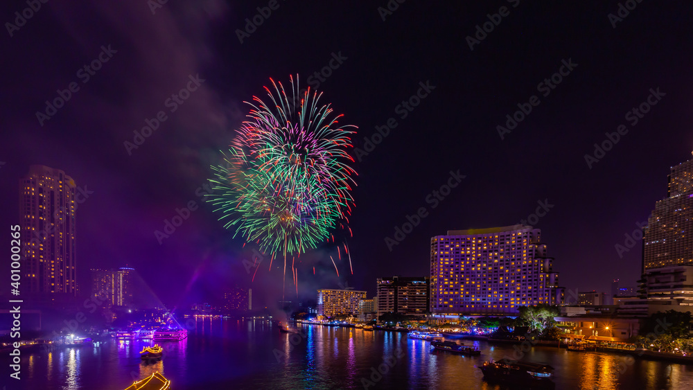 Fireworks to celebrate New Year on the Chao Phraya River in Bangkok, Thailand. Fireworks to celebrate New Year on the Chao Phraya River in Bangkok, Thailand.