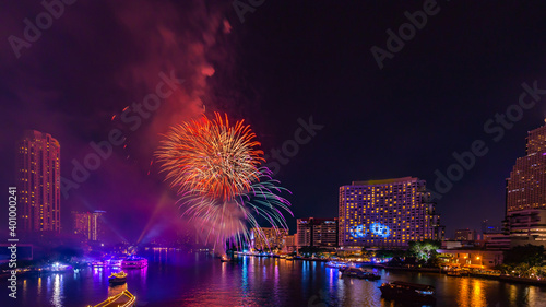 Fireworks to celebrate New Year on the Chao Phraya River in Bangkok, Thailand.