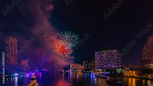 Fireworks to celebrate New Year on the Chao Phraya River in Bangkok, Thailand.