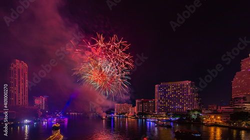 Fireworks to celebrate New Year on the Chao Phraya River in Bangkok, Thailand.