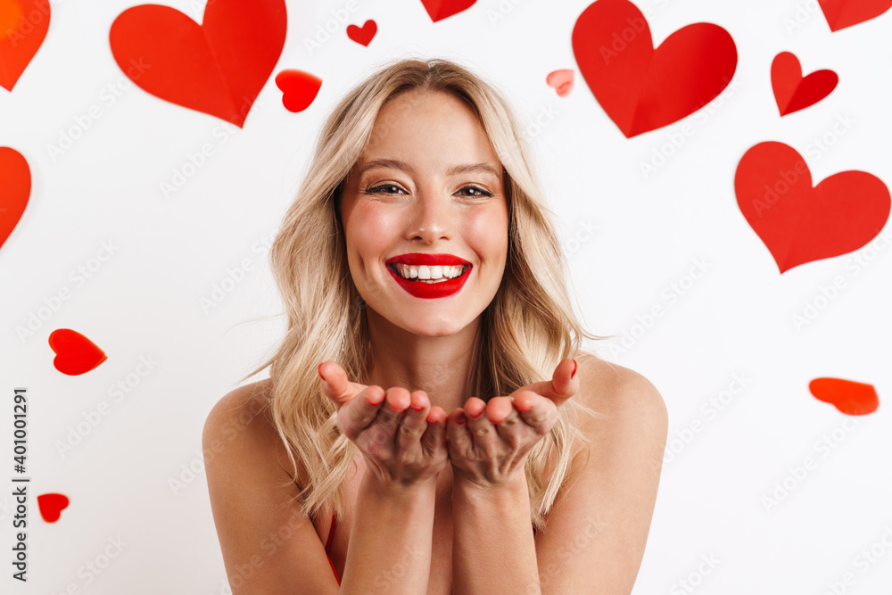 Cheerful nice girl holding copyspace and smiling Cheerful nice girl holding copyspace and smiling
