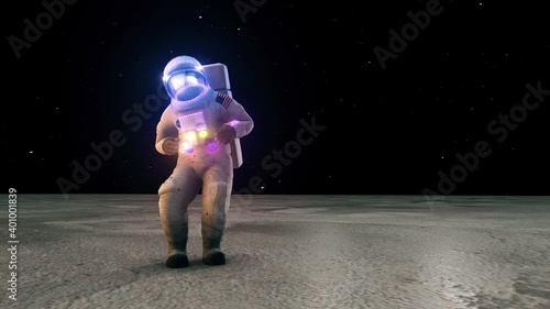 Dancing astronaut in moon surface with colorfull particles 4k. High quality 4k footage