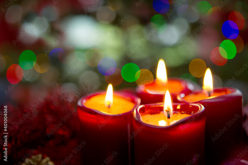 Four red candles for Advent. Christmas background. Four red candles for Advent. Christmas background.