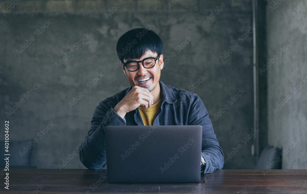 man work using computer hand typing laptop keyboard contact us online chatting search form internet sitting at office.concept for technology device communication business people man work using computer hand typing laptop keyboard contact us online chatting search form internet sitting at office.concept for technology device communication business people