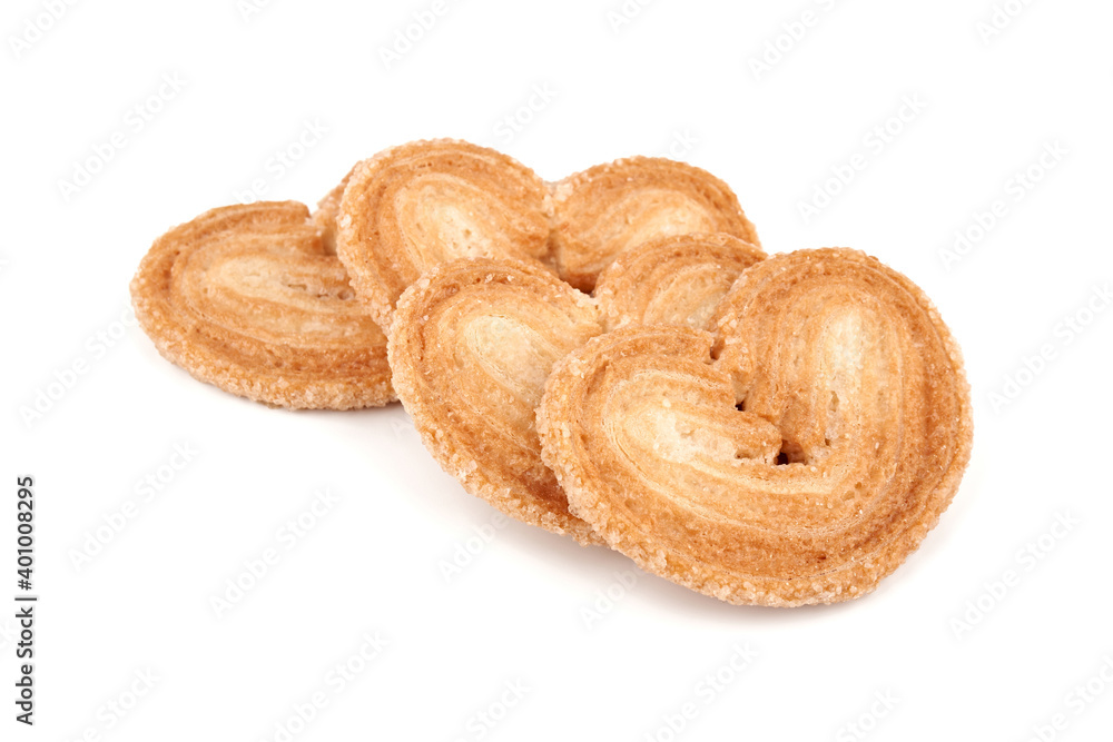 Puff pastry cookies. Fresh puff pastry cookies in the shape of a heart. Classic French pastries. Pig ear, elephant ear cookies, French hearts. Heart shaped puff pastry isolated on white background Puff pastry cookies. Fresh puff pastry cookies in the shape of a heart. Classic French pastries. Pig ear, elephant ear cookies, French hearts. Heart shaped puff pastry isolated on white background