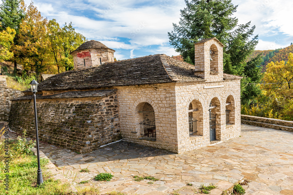 The picturesque moni Rogovou during fall season the stone build church is  located  near tsepelovo aboves vikos gorge on Tymfi mounain t, Zagori, Epirus, Greece.