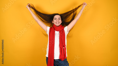 Girl develops hair on a yellow background
