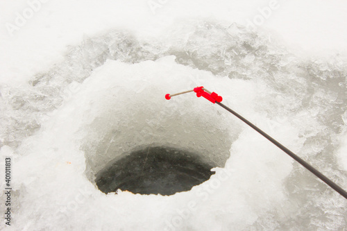 fishing with ice fishing rods  in the oles photo