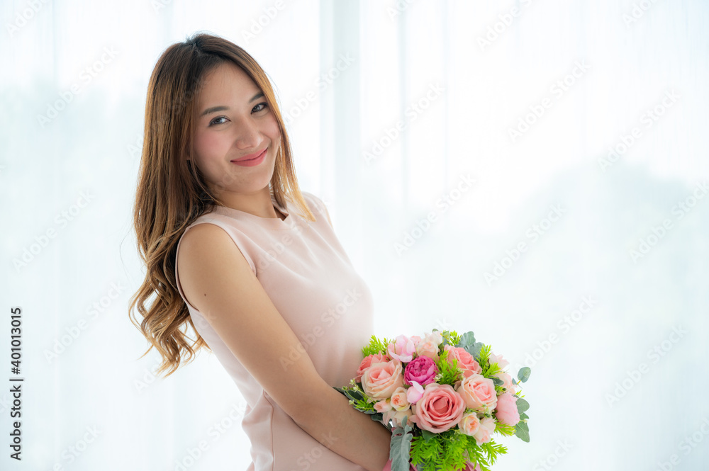 portrait of her she attractive glad cheerful amazed girl holding festal gift celebratory having fun christmas time, and new years - 2021 celebration portrait of her she attractive glad cheerful amazed girl holding festal gift celebratory having fun christmas time, and new years - 2021 celebration