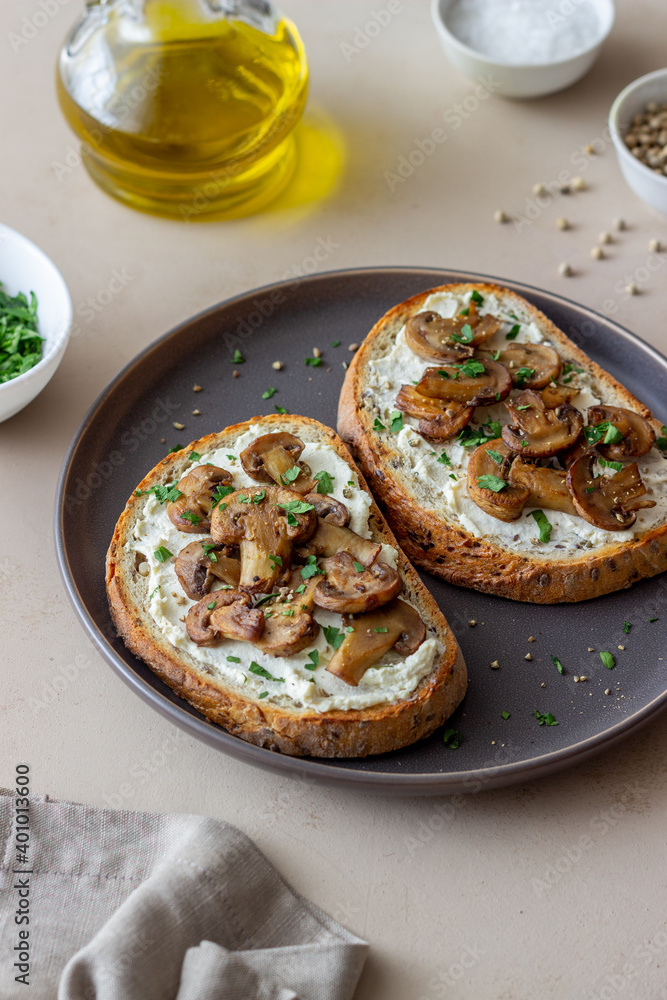 Bruschetta with mushrooms and white cheese. Healthy eating. Vegetarian food.