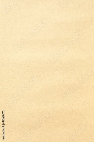 Vertical kraft brown paper surface background texture 