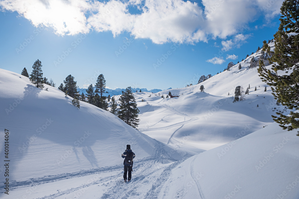 winter hiker at mountain trail in snowy landscape Rofan, austrian alps