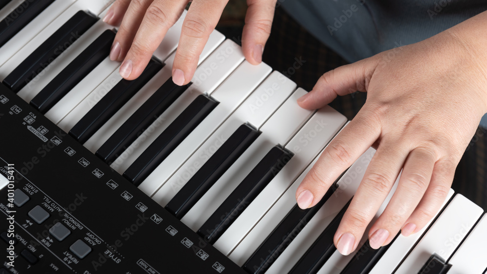 Musician at a concert playing piano Musician at a concert playing piano