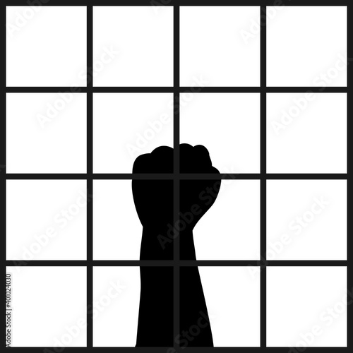 Silhouette man hand in prison
