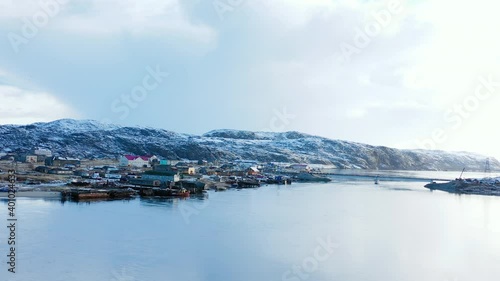 Aerial panoramic view of a coastal village in Alaska, USA. Winter in Alaska.