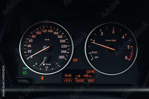 Foto Sport car tachometer and dashboard with  backlight