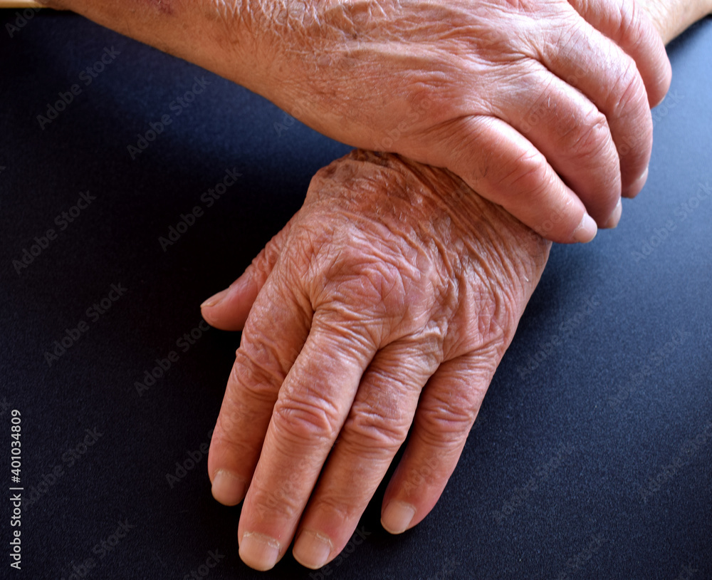 Fototapeta premium male hands on black surface