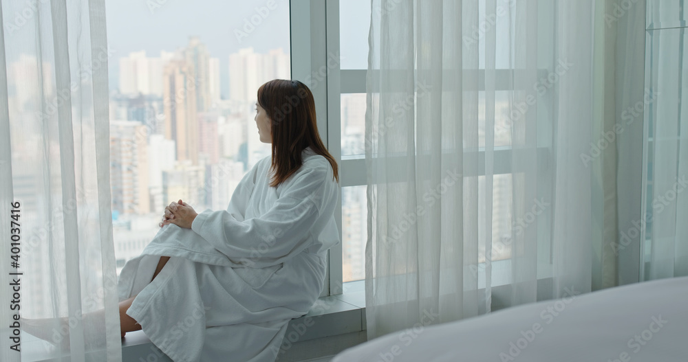 Woman look at the city view Woman look at the city view