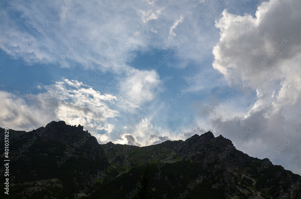 Picturesque view to rocky mountains against cloudy sky in High Tatras (Vysoke Tatry), Slovakia