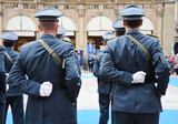 Armed policemen lined up in the city square before performing the ceremony - The Army soldiers standing in row they are wearing and wear military uniforms - Concept of patriotism defense of the nation