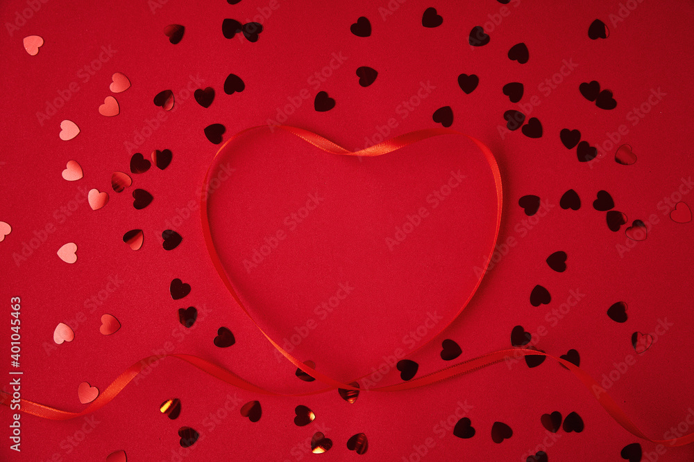 Valentine's Day background. Hearts on red background. Valentine day concept. Top view, flat lay