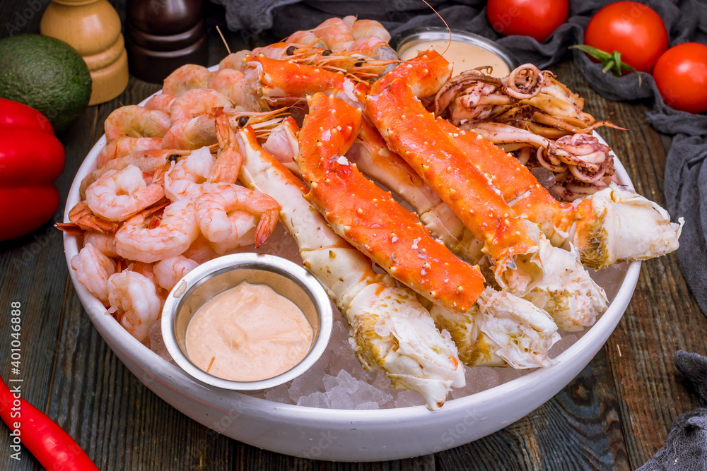 assorted seafood on ice, crab, shrimps, prawns, squid assorted seafood on ice, crab, shrimps, prawns, squid