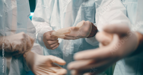 Crop doctors putting on gloves