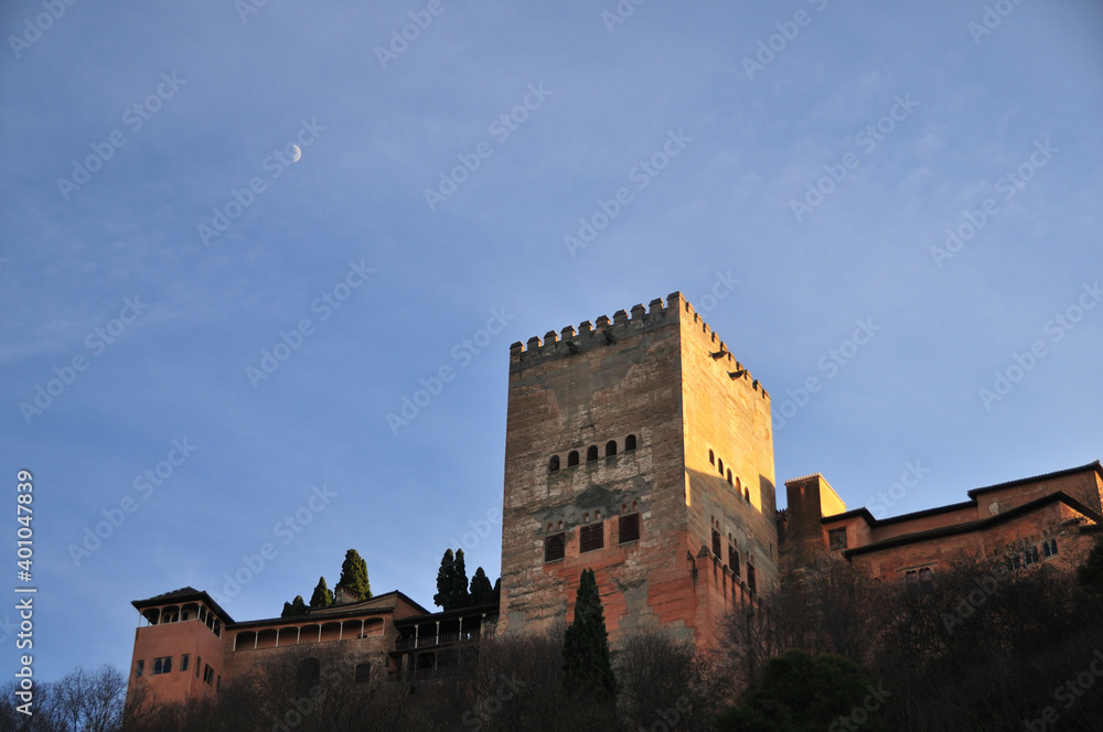 Detail of Alhambra palace, Granada, Andalusia with half moon, December 2020