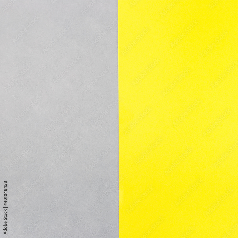Colors of year 2021, yellow paper and gray concrete texture, blank background for template, horizontal, copy space Colors of year 2021, yellow paper and gray concrete texture, blank background for template, horizontal, copy space