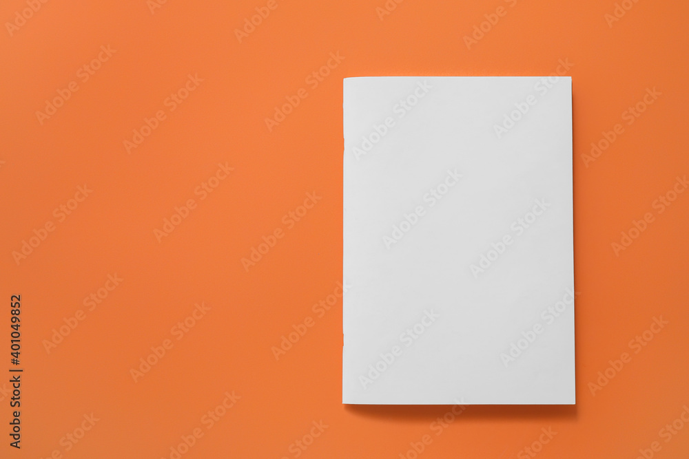 Blank magazine on color background Blank magazine on color background