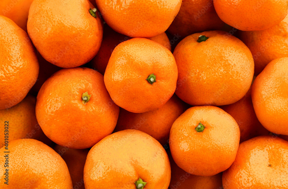 Tangerines close-up, background. The view from top Tangerines close-up, background. The view from top