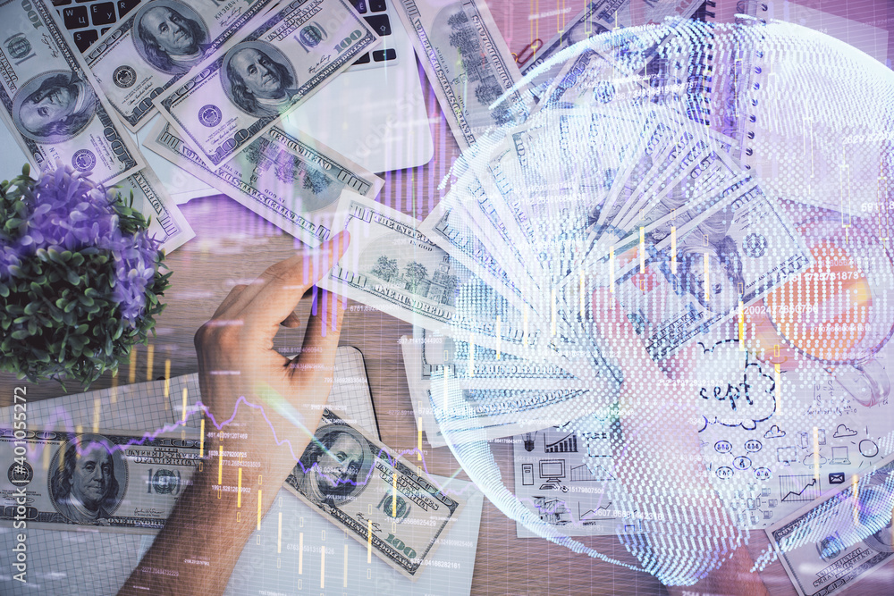 Multi exposure of financial graph drawing hologram and USA dollars bills and man hands. Analysis concept. Multi exposure of financial graph drawing hologram and USA dollars bills and man hands. Analysis concept.