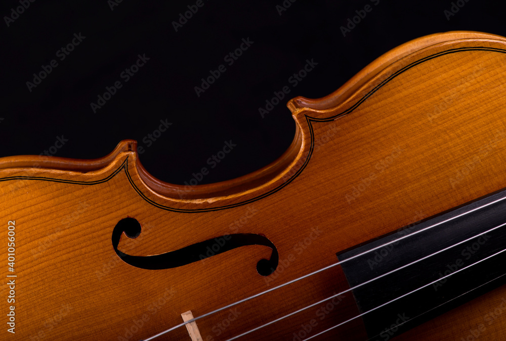 Violin music instrument closeup isolated on black Violin music instrument closeup isolated on black