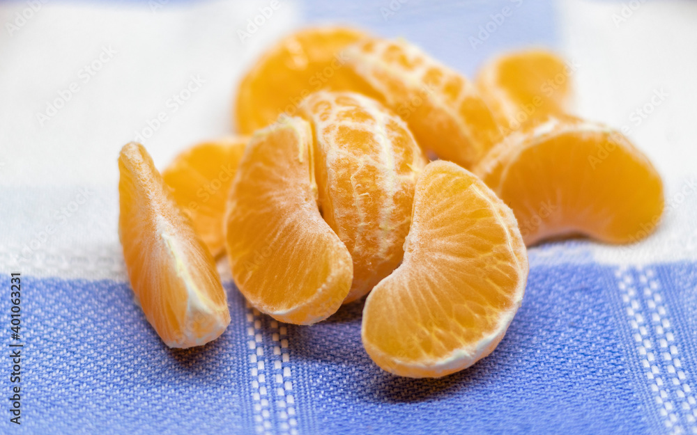 Detail of Tangerines in the foreground ready to eat Detail of Tangerines in the foreground ready to eat